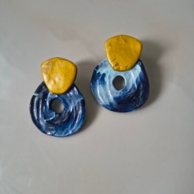 Carmina azul y dorado